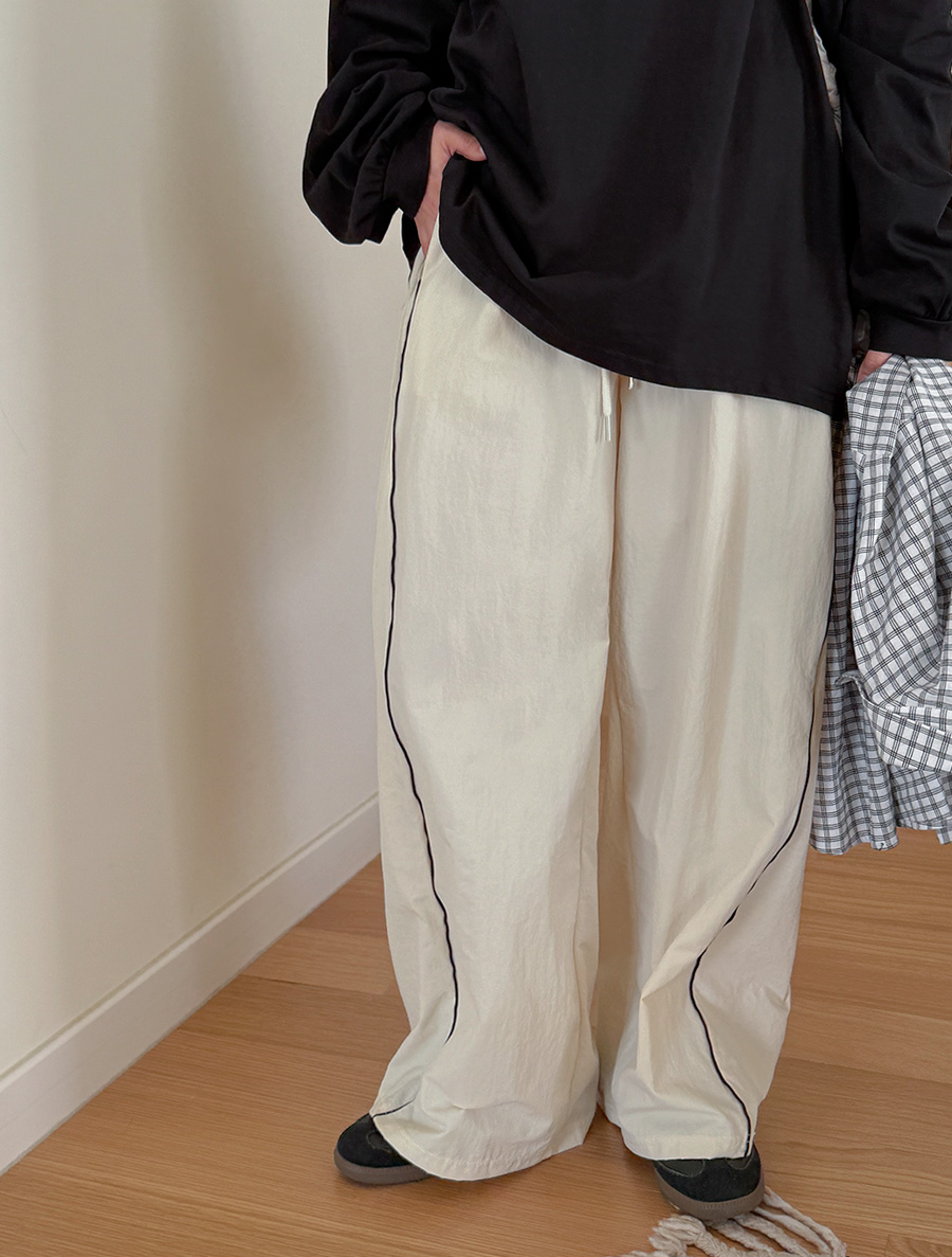 Curen Contrast Cut Long Waistband Pants